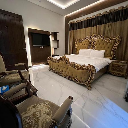Palm Tree Hotel Lahore Buitenkant foto